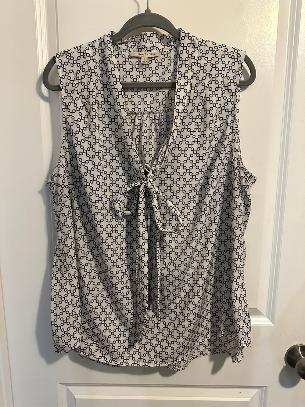 41 Hawthorn Ivory and Black Geometric Tie-Neck Sleeveless Blouse